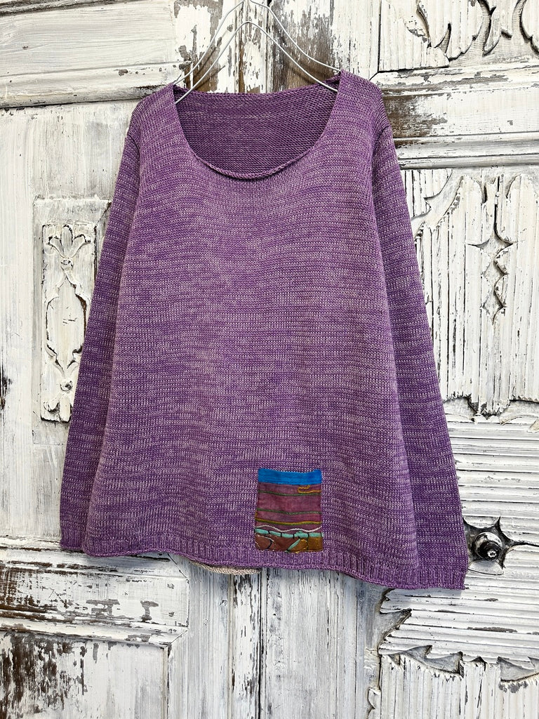 lila triko arkası pile detaylı