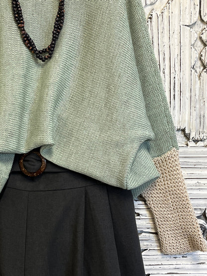 Yeşil triko kazak  bej kol örgü ve cepli oversize model