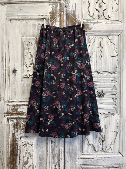 mor çiçek desenli yanları cepli midi etek