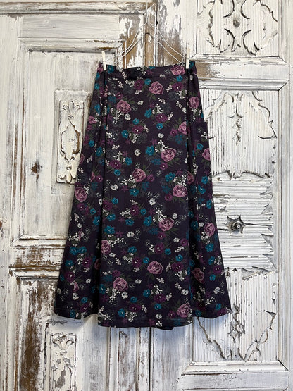 mor çiçek desenli yanları cepli midi etek