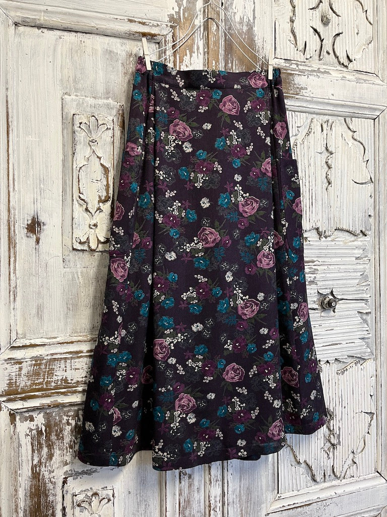 mor çiçek desenli yanları cepli midi etek