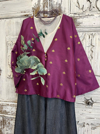 el işi süslemeli mor ceket