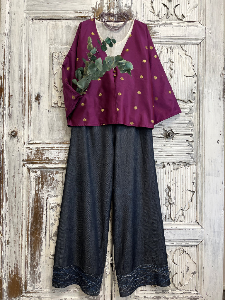 el işi süslemeli mor ceket