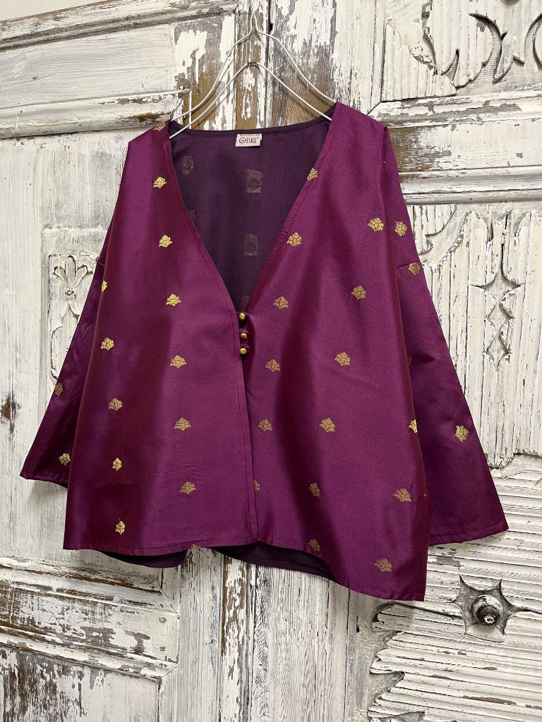 el işi süslemeli mor ceket