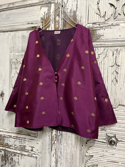 el işi süslemeli mor ceket